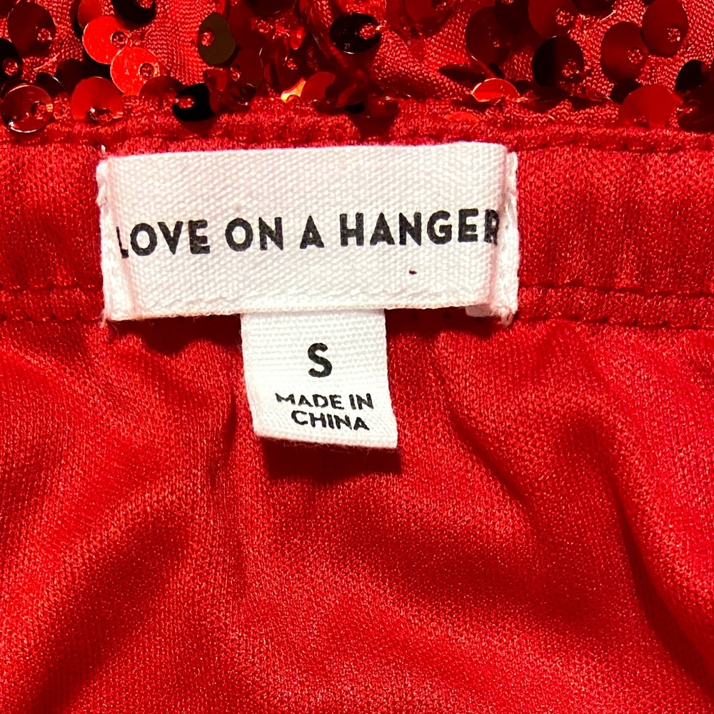 LOVE ON A HANGER Christmas Red Sequin Tinsel Crop Top & Skirt Women's
Size Small - Picture 7 of 8